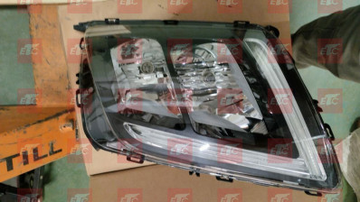 VO 24159415 Фара левая FMX